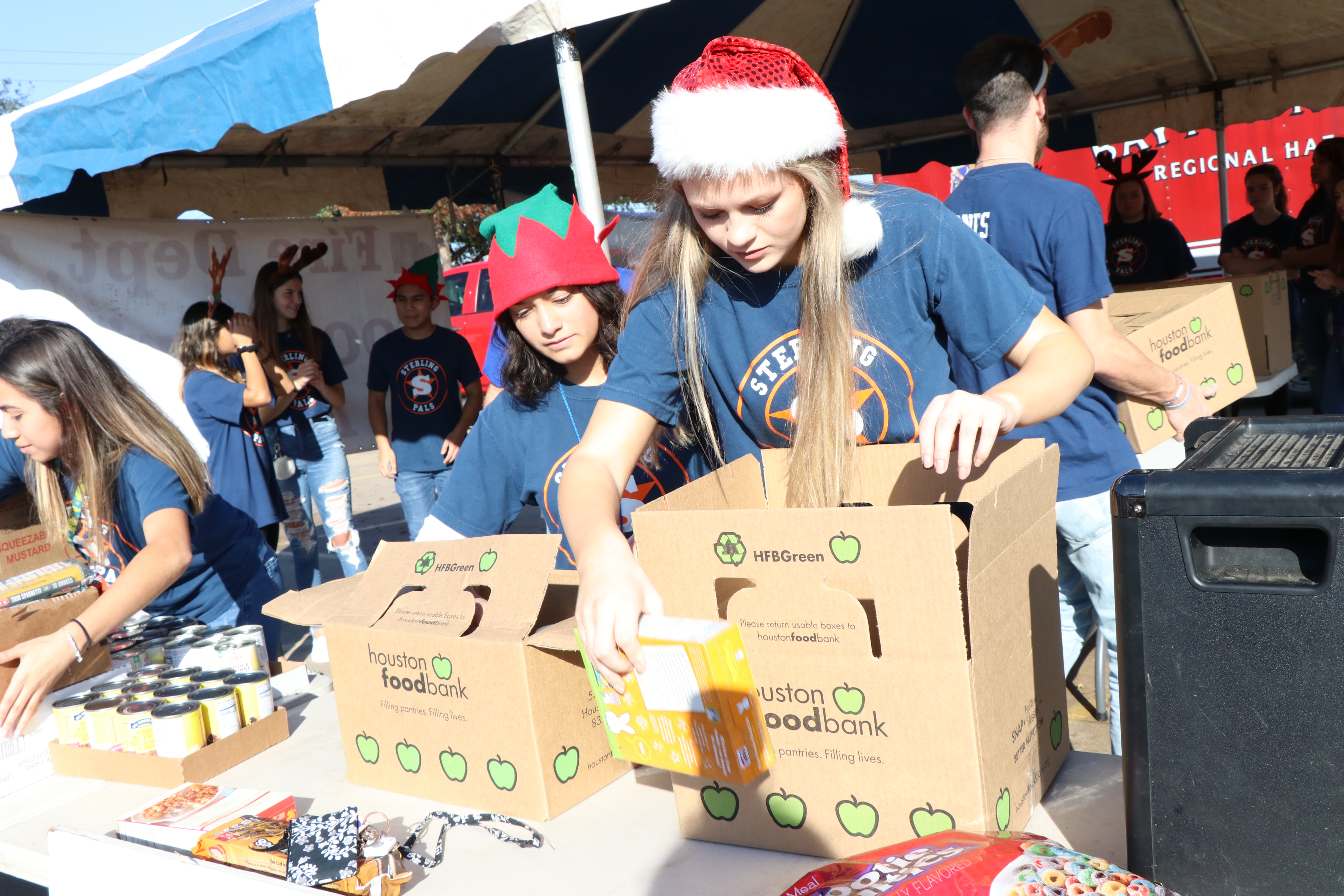 Ross S. Sterling High School PALs, sort food items for ABC 13