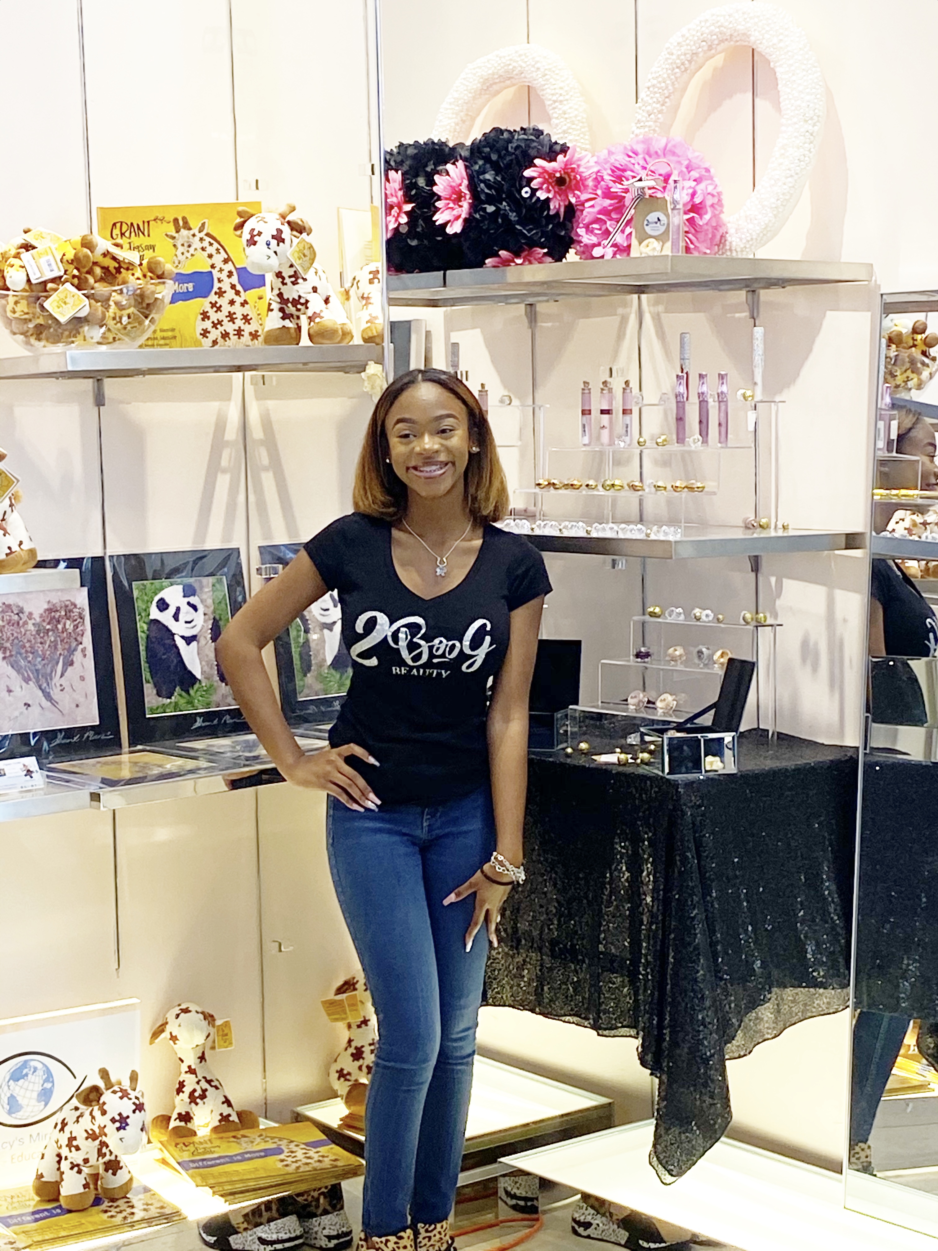 Lauren in the shop at the Galleria that houses her products
