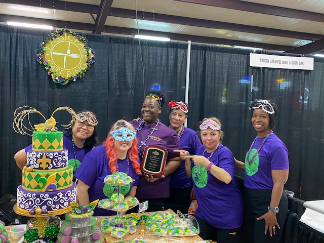 Nutrition services staff accept best booth award