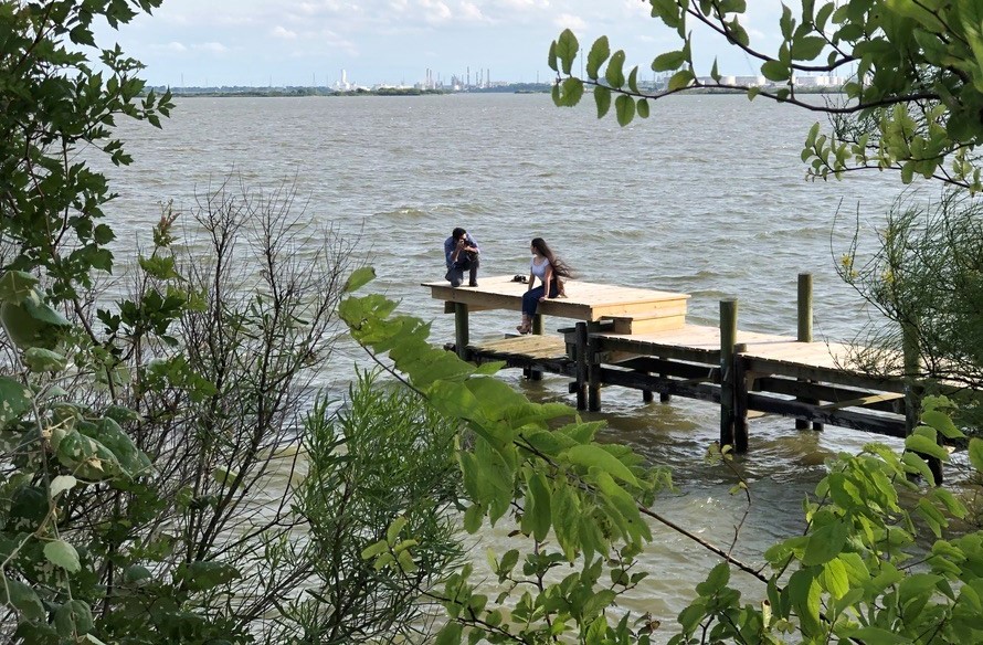 Rodriguez sitting on pier