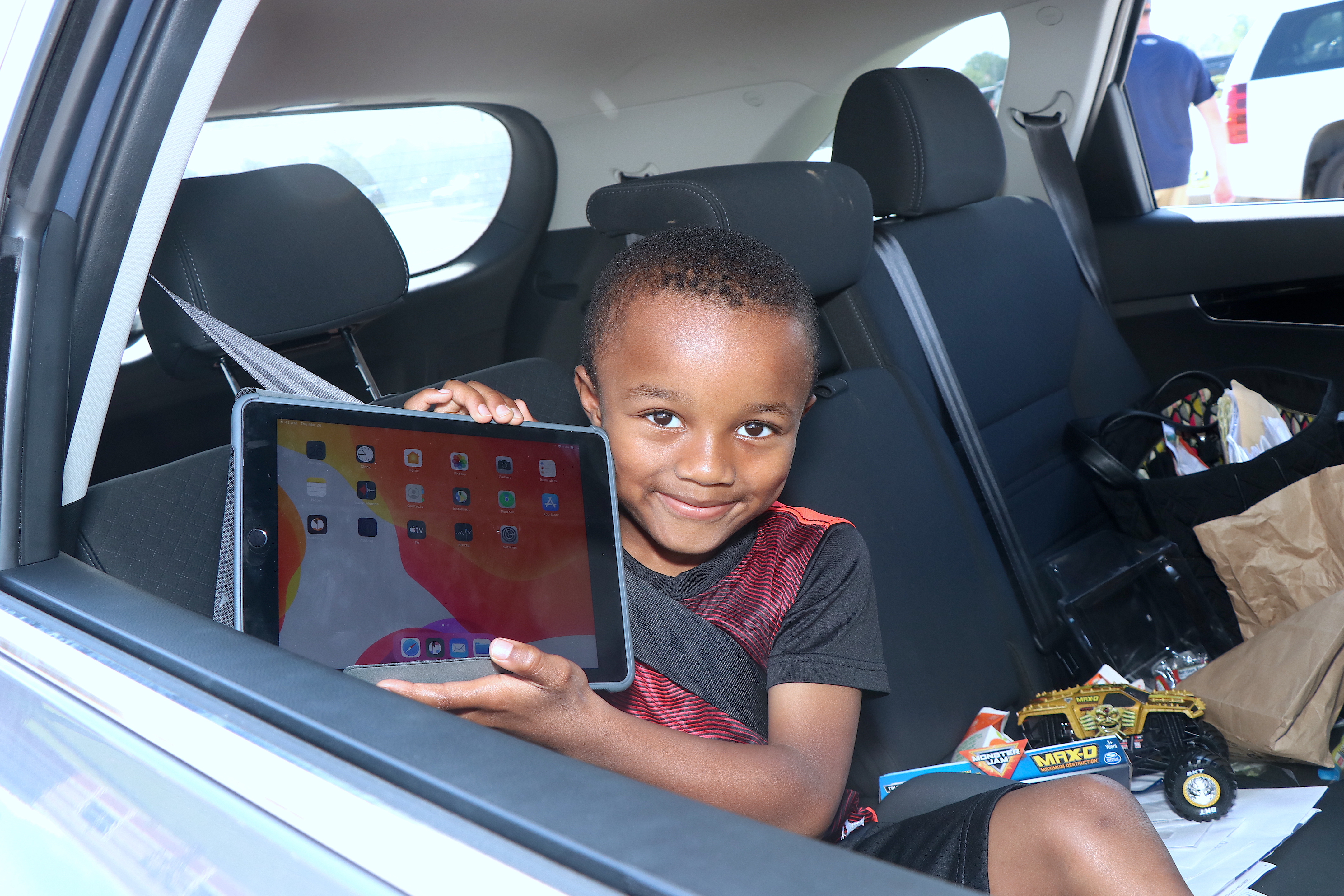 Student holds up device