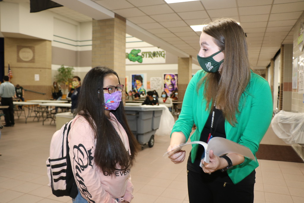 Teacher at Horace Mann assist student