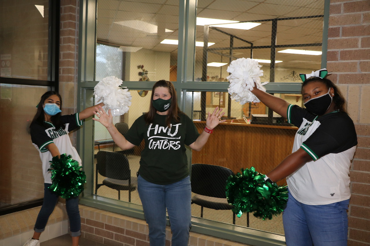 Cheerleaders at Horace Mann introduce principal