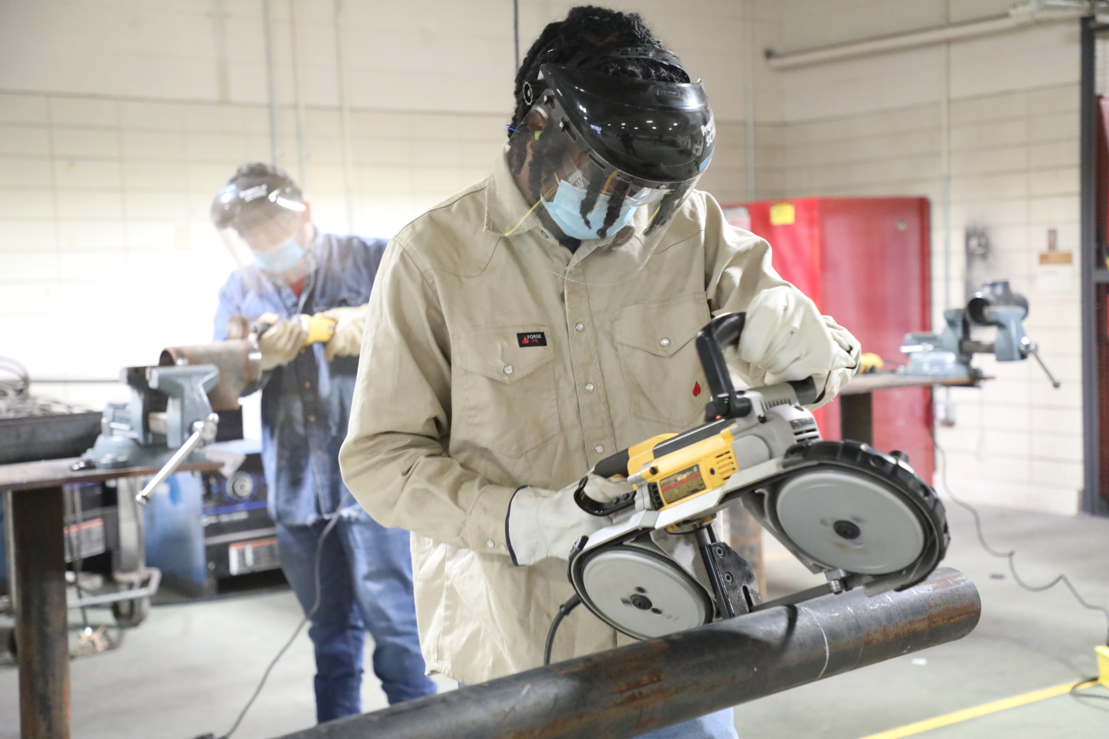 Student practices pipefitting