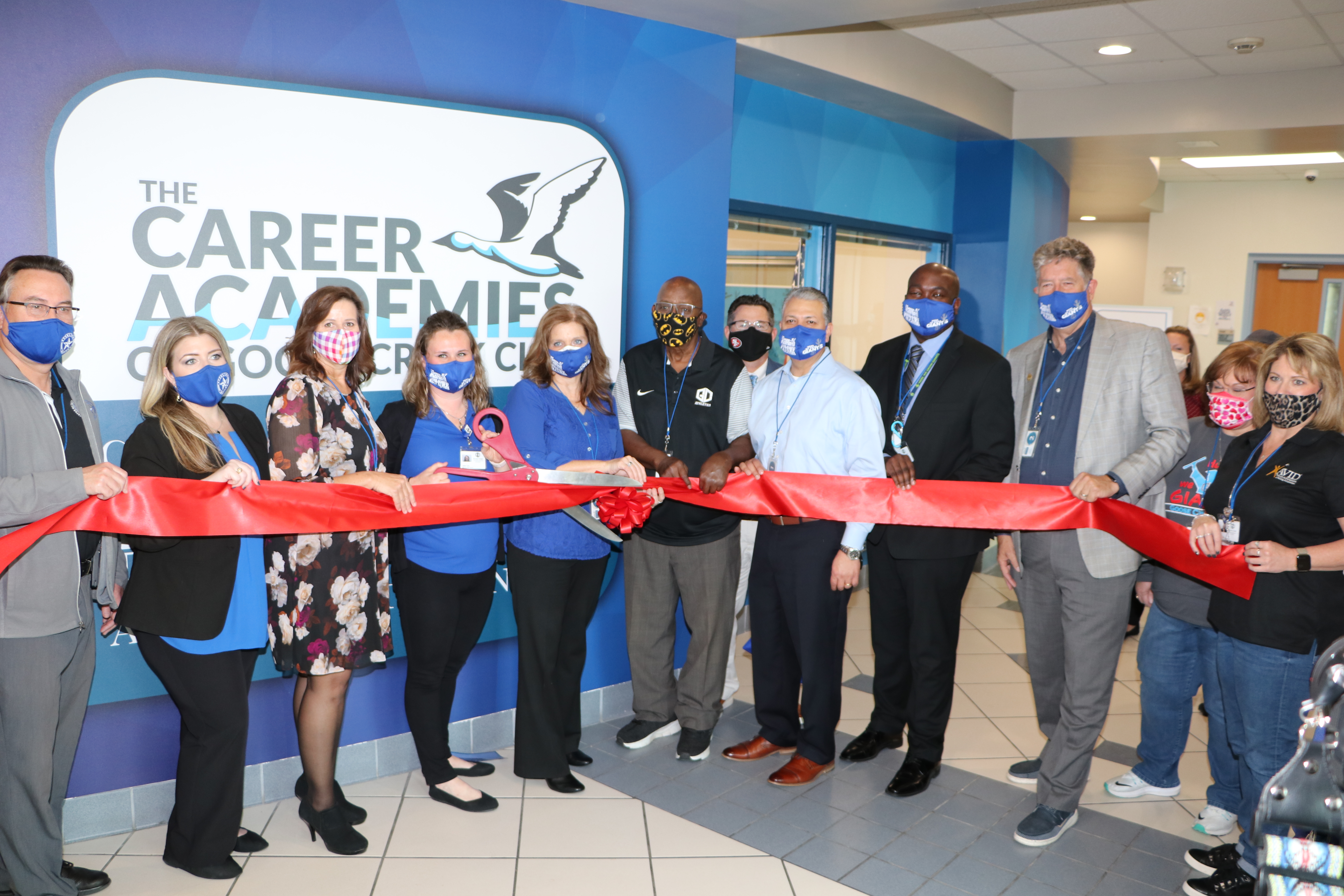 Community members and staff cut ribbon