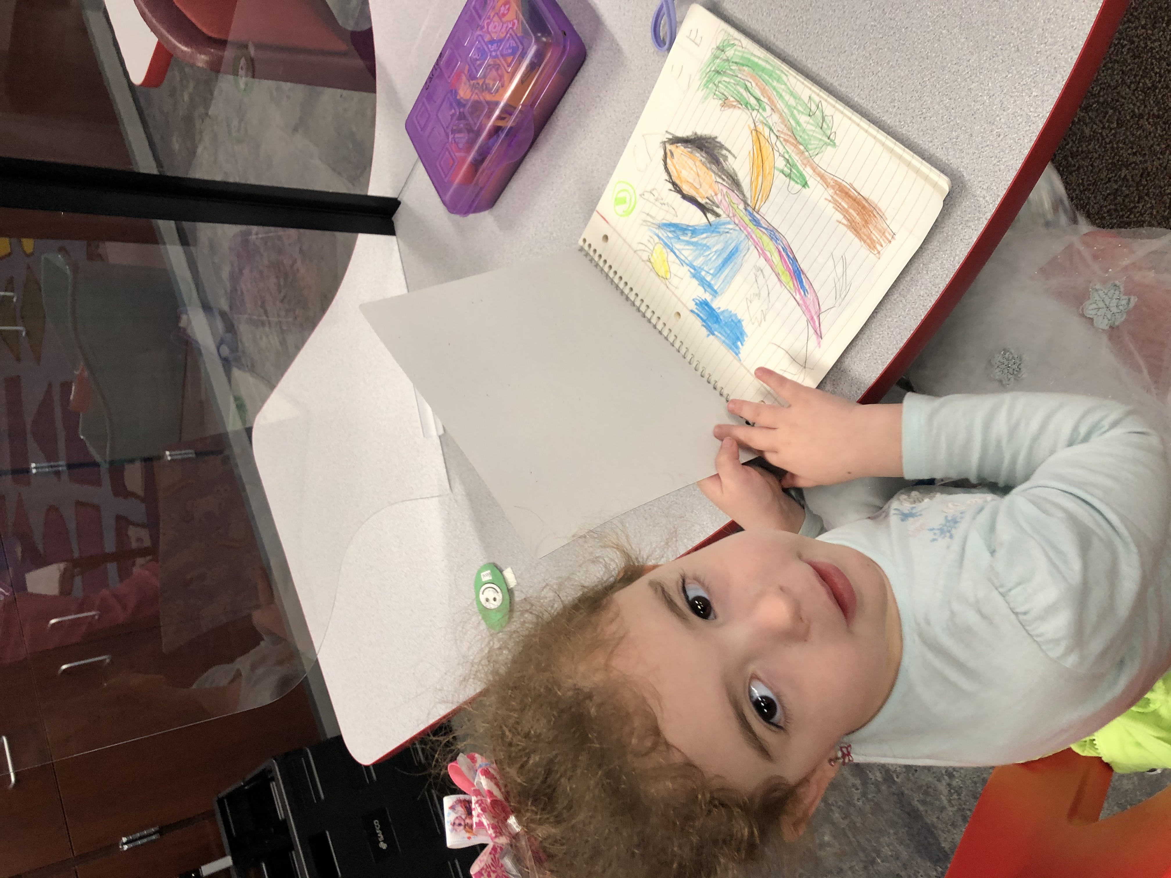 Pre-k students draws in class