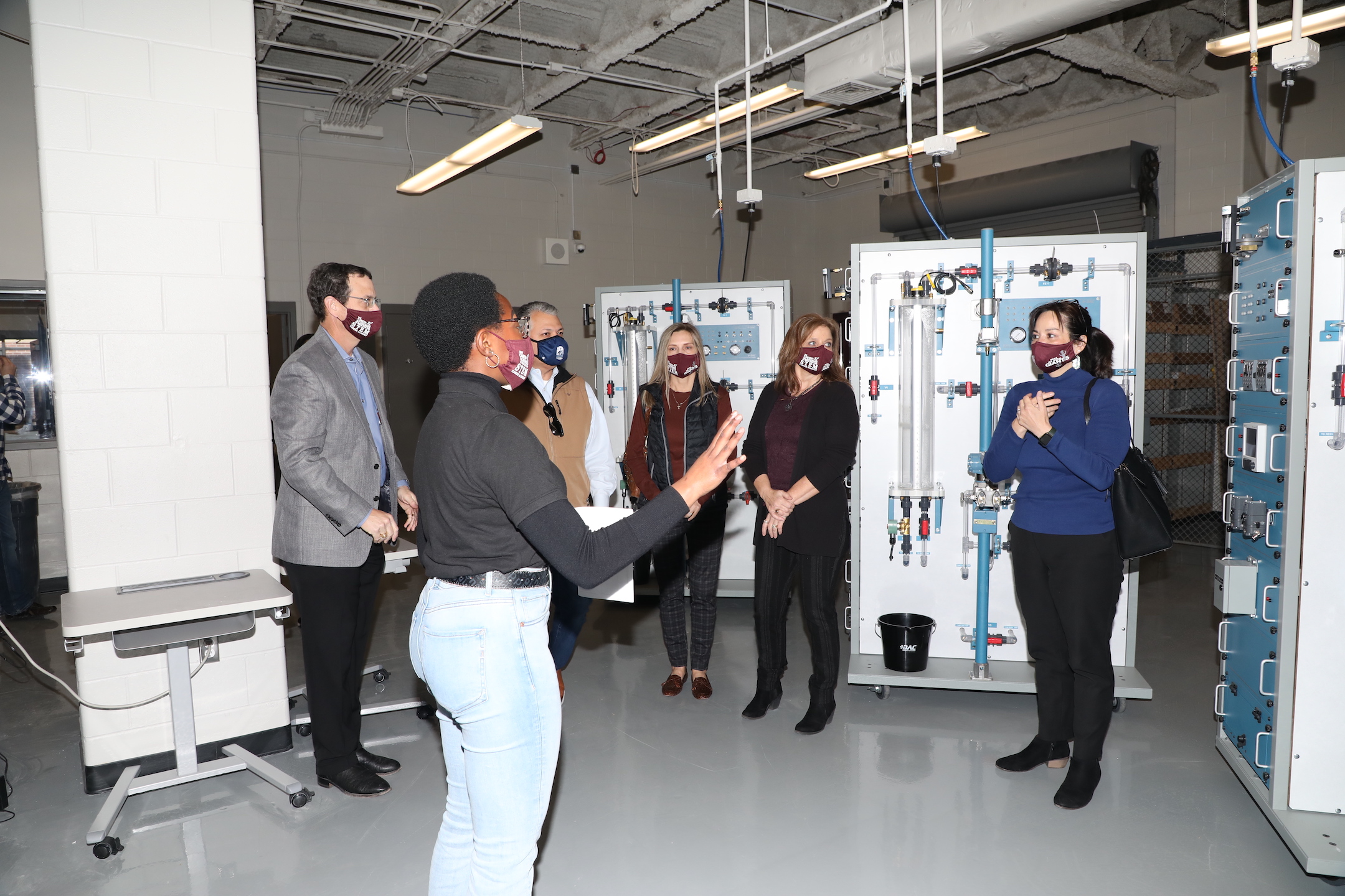 student leads tour of new lab