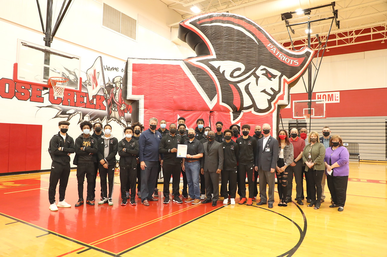 Mayor presents proclamation to gcm boys basketball team