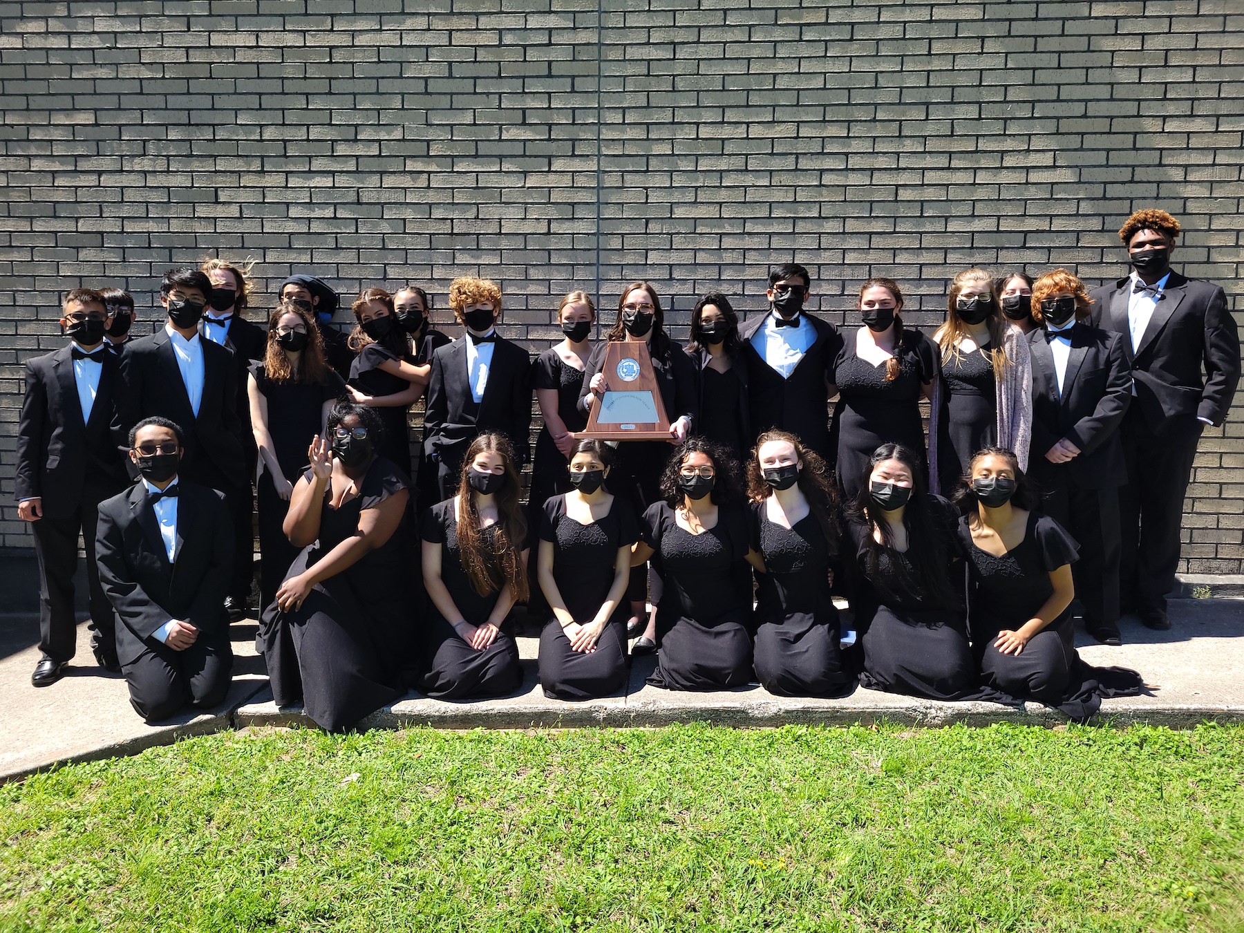 Sterling Orchestra pose with award