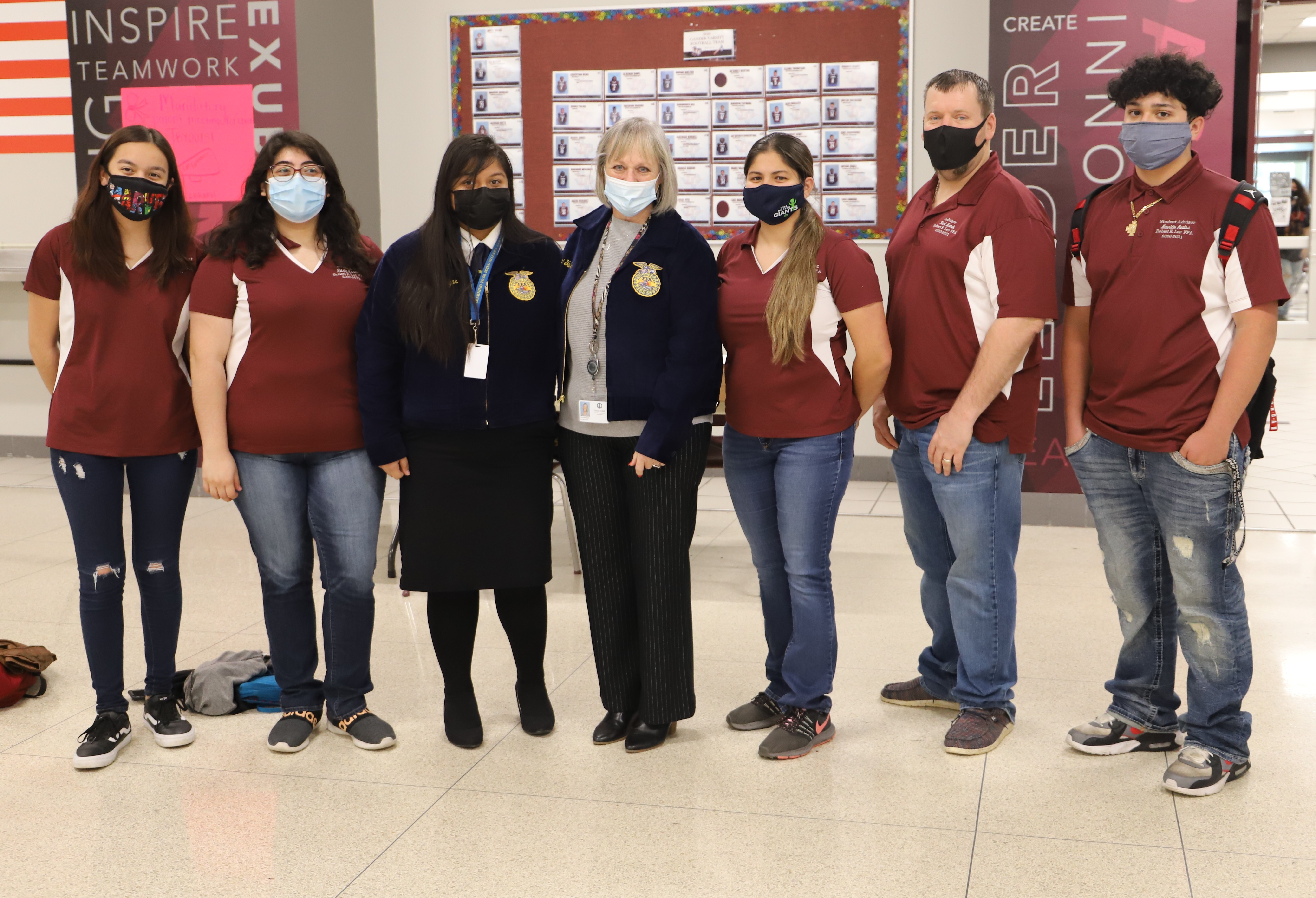 FFA advisors pose with Yarbrough