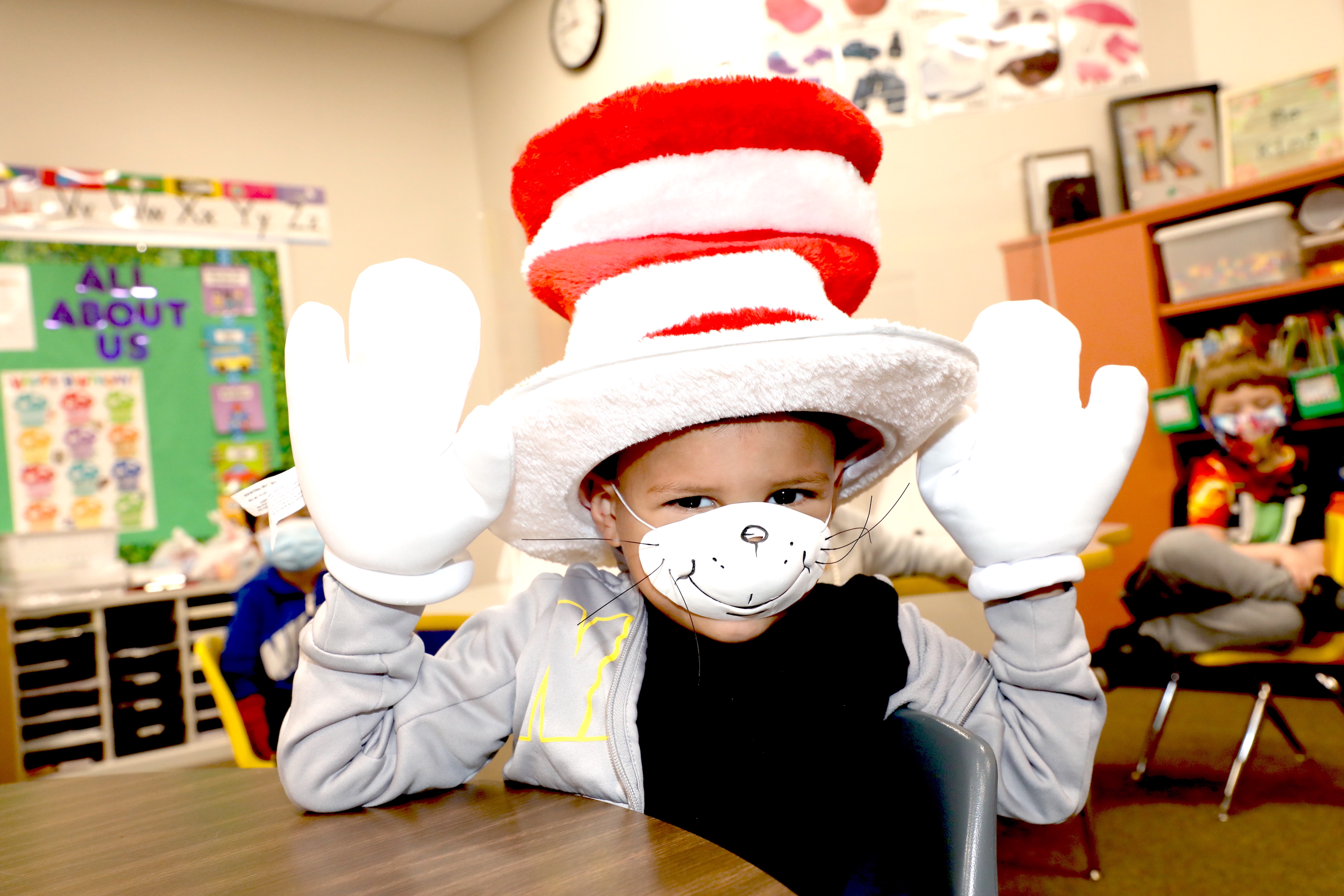 Student makes face wearing cat in the hat outfit