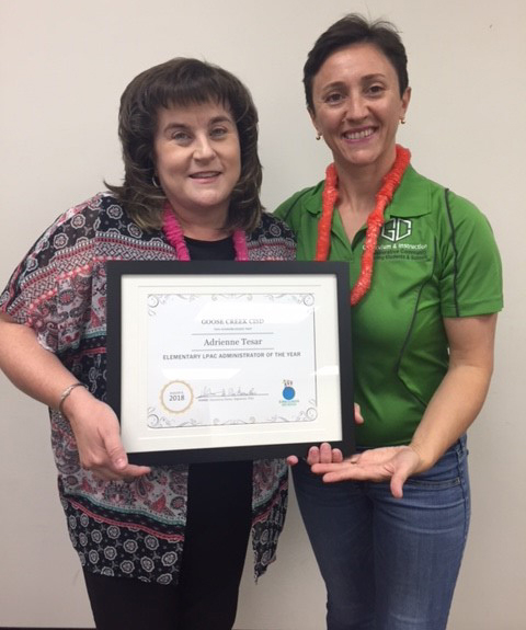
Pilar Moreno-Recio (right), director of bilingual education, presents a certificate to Adrienne Tesar, assistant principal at Travis Elementary, who was selected as the Elementary Language Proficiency Assessment Committee (LPAC) Administrator of the Year for Goose Creek CISD.
