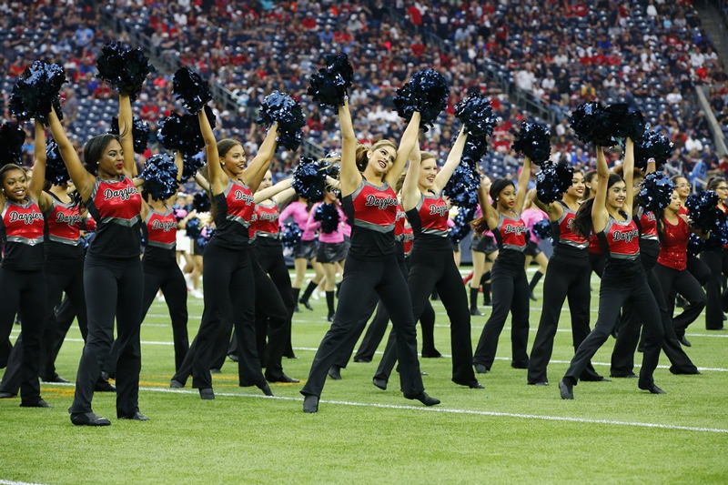 Dazzlers perform at football game