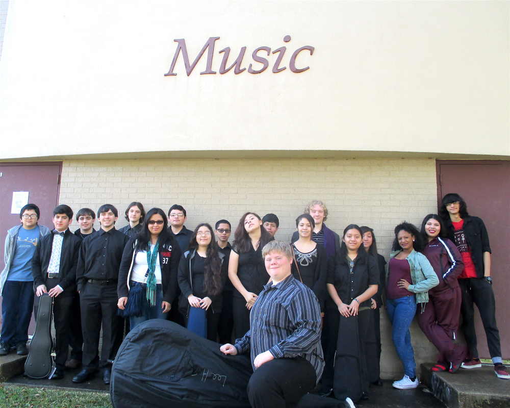 REL Orchestra students poses in front of music hall