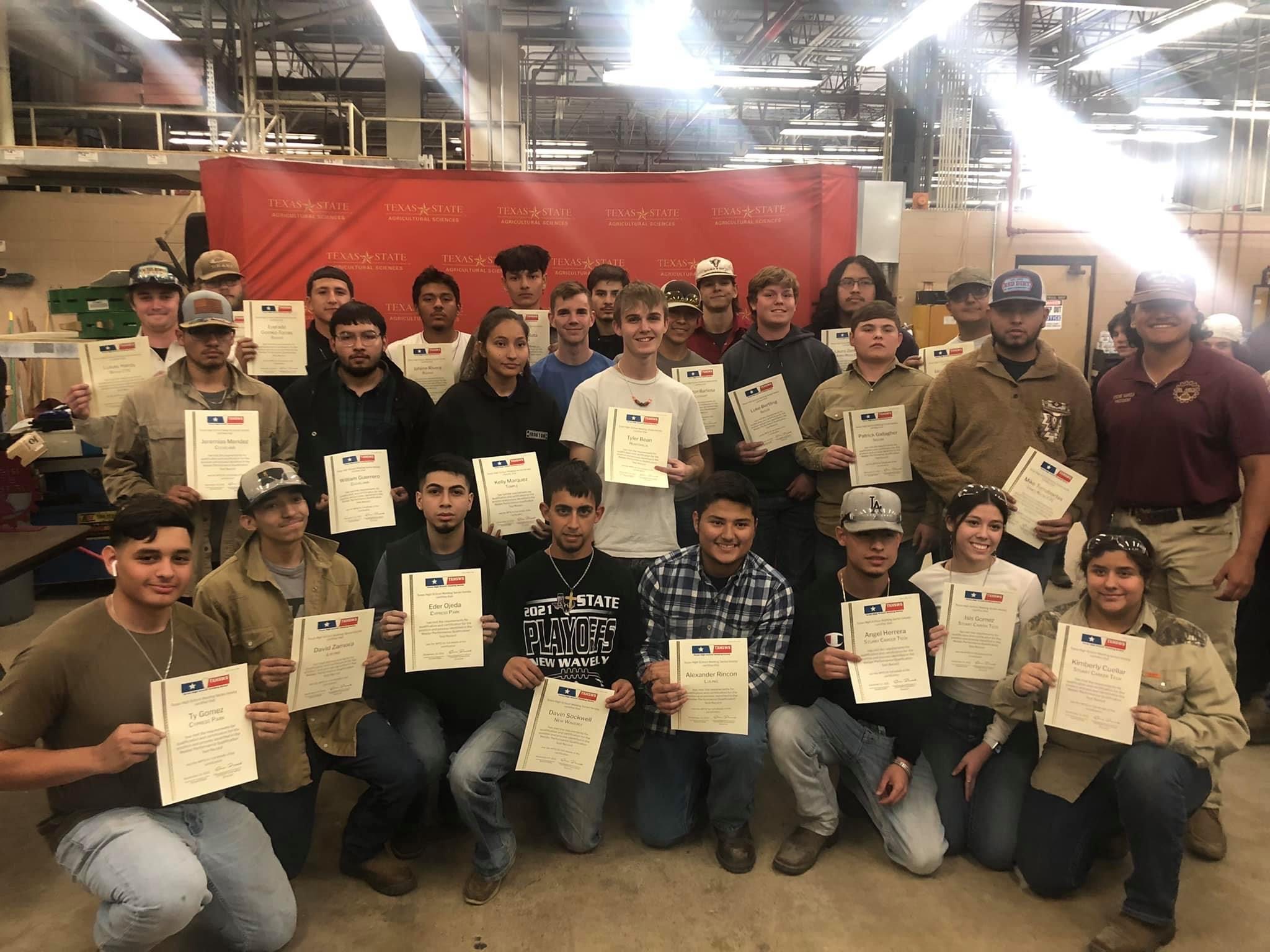 industrial maintenance students pose with awards