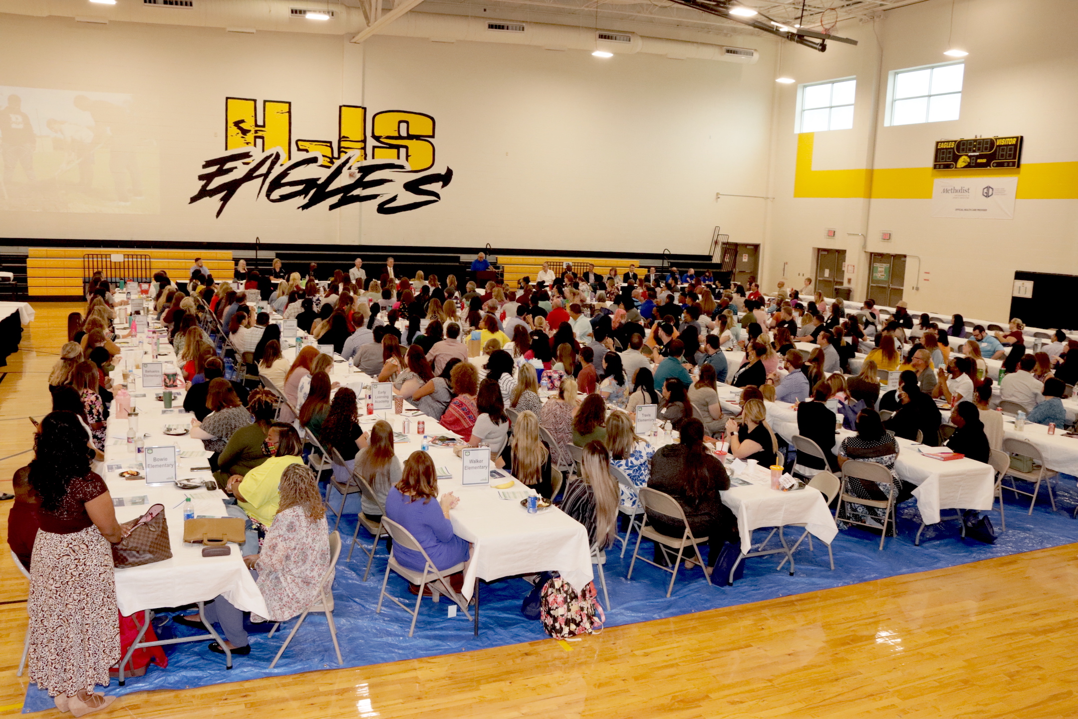 new teachers listen to human resources director