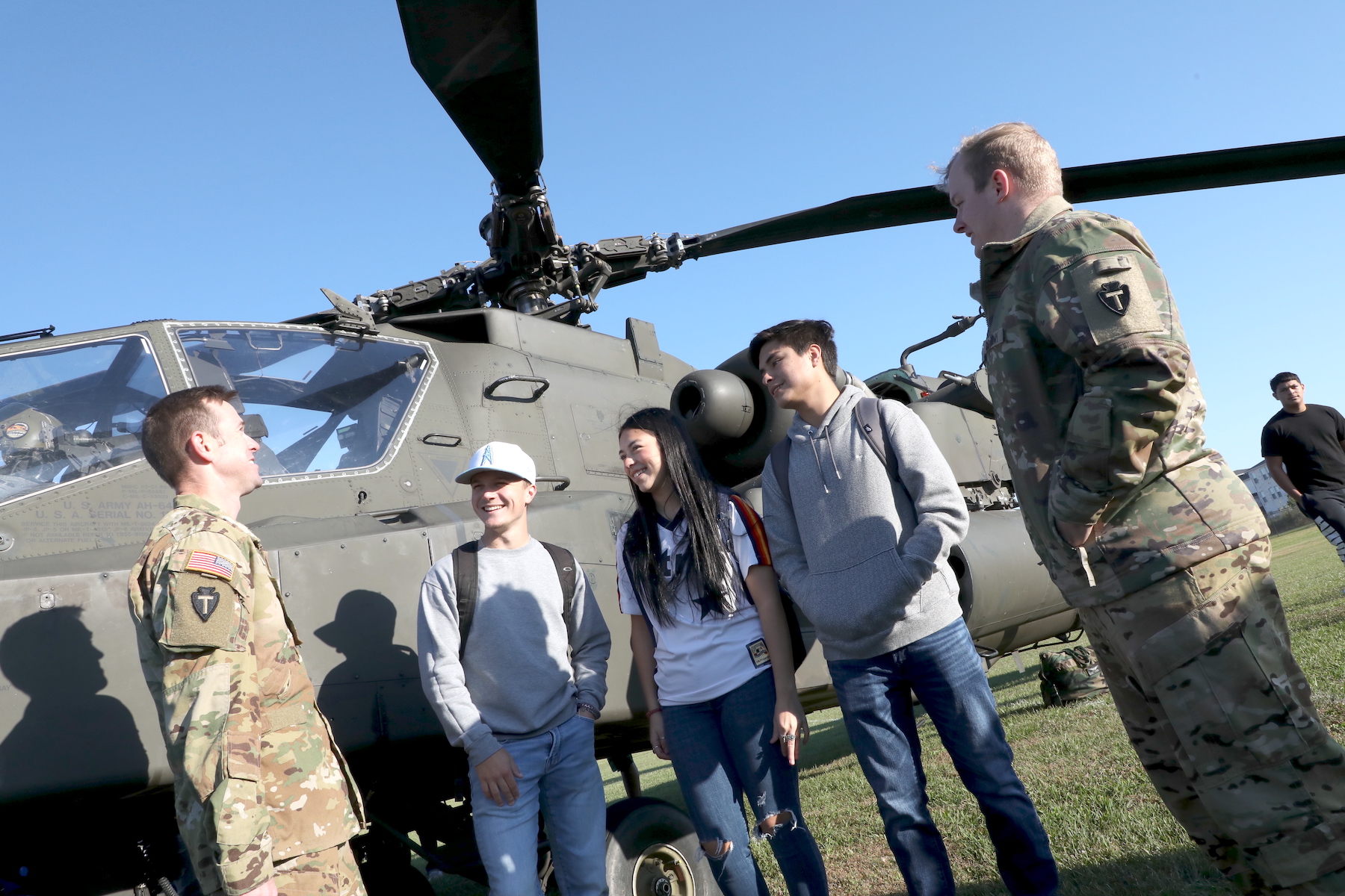 students speak with officers