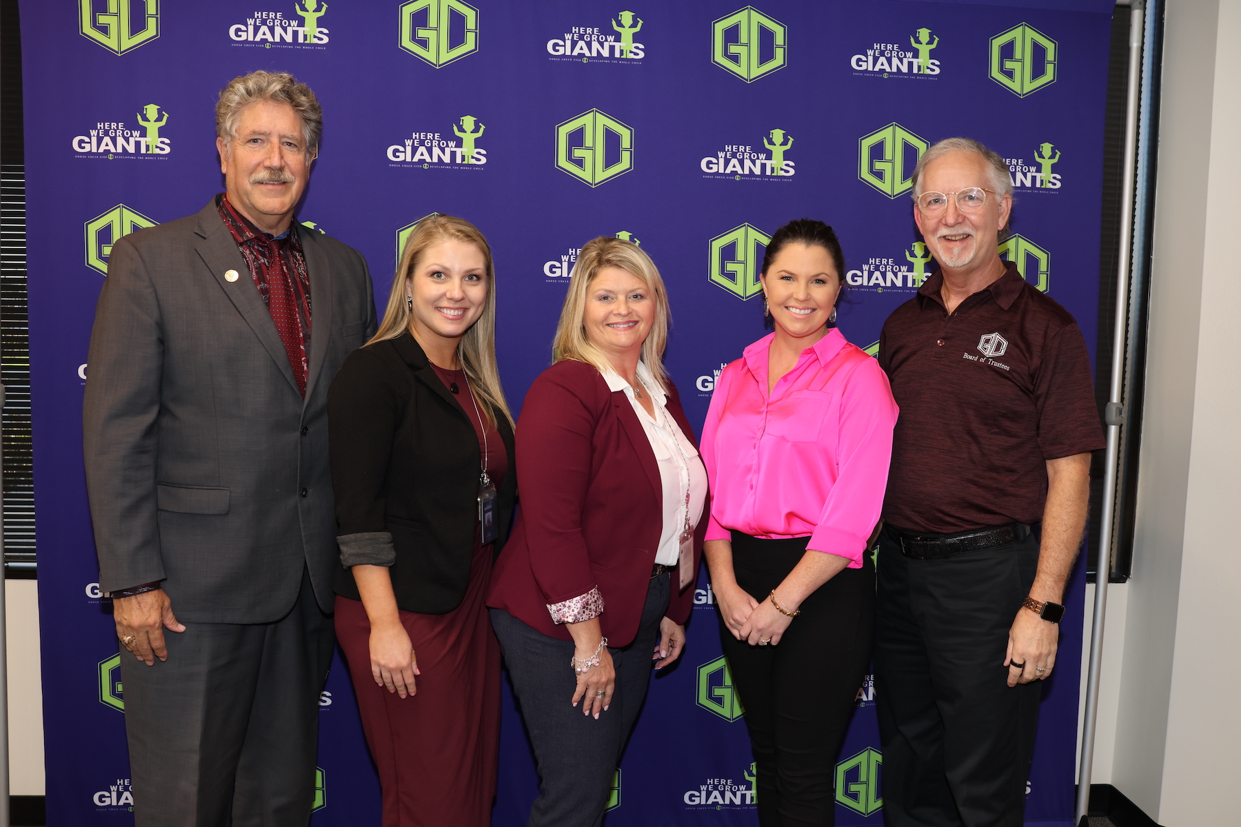 district admin pose with preslie cox with covestro baytown at the board meeting