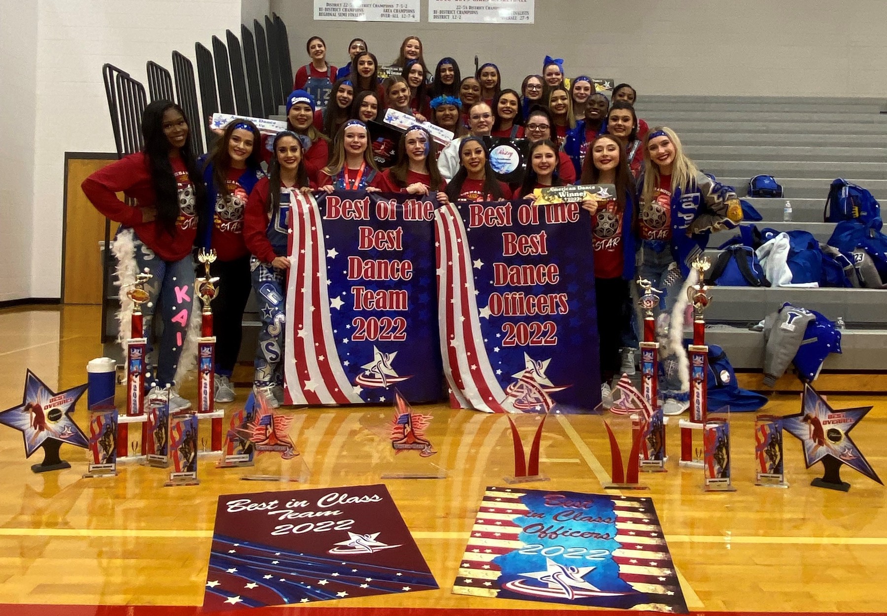 Sterling Stars and Sapphires pose with trophies