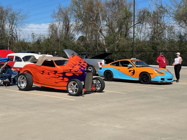 Cars lined up at car show