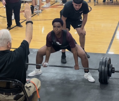 Tayler Edwards lifting weights