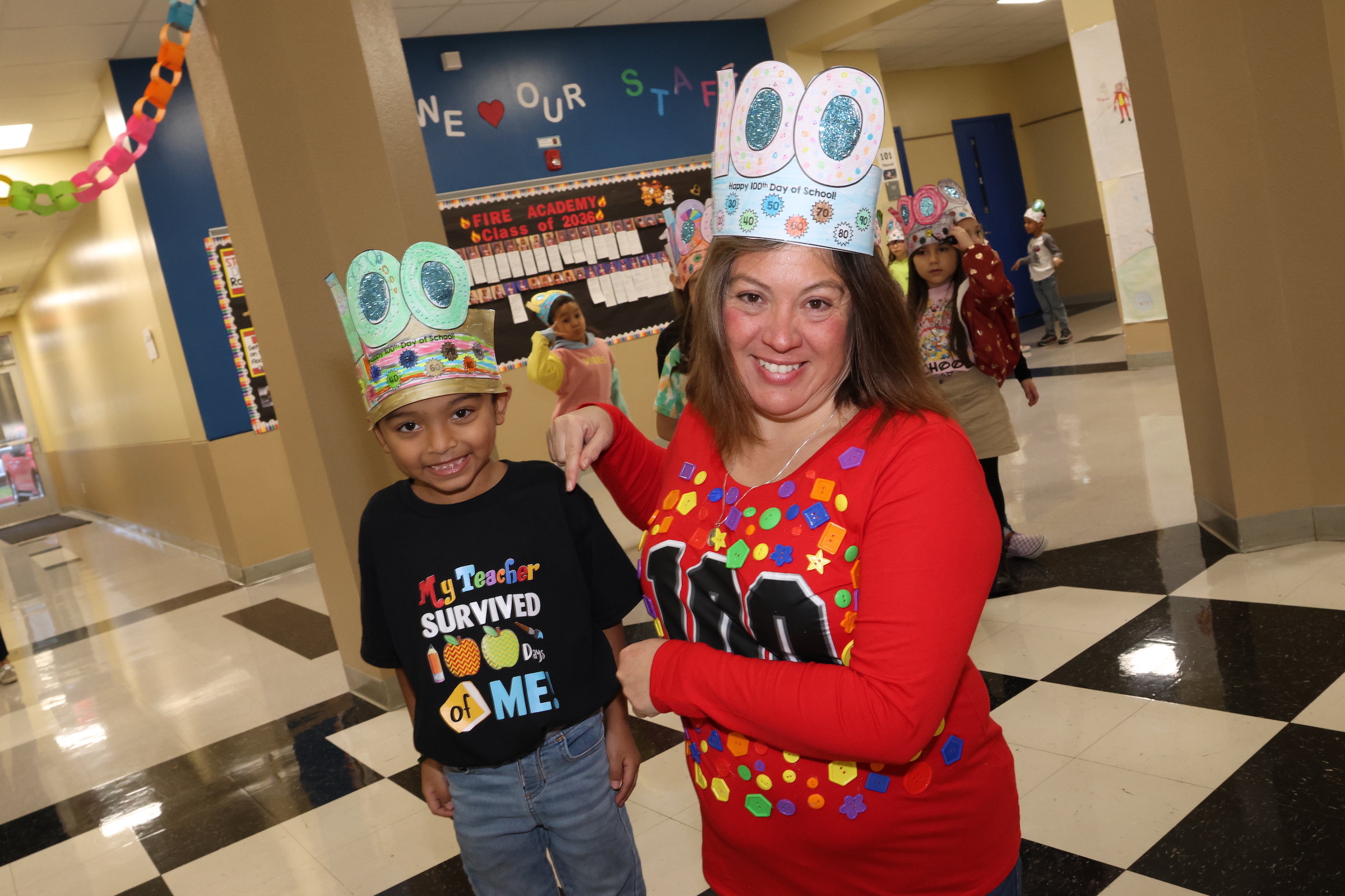 ashbel smith student poses with their teacher