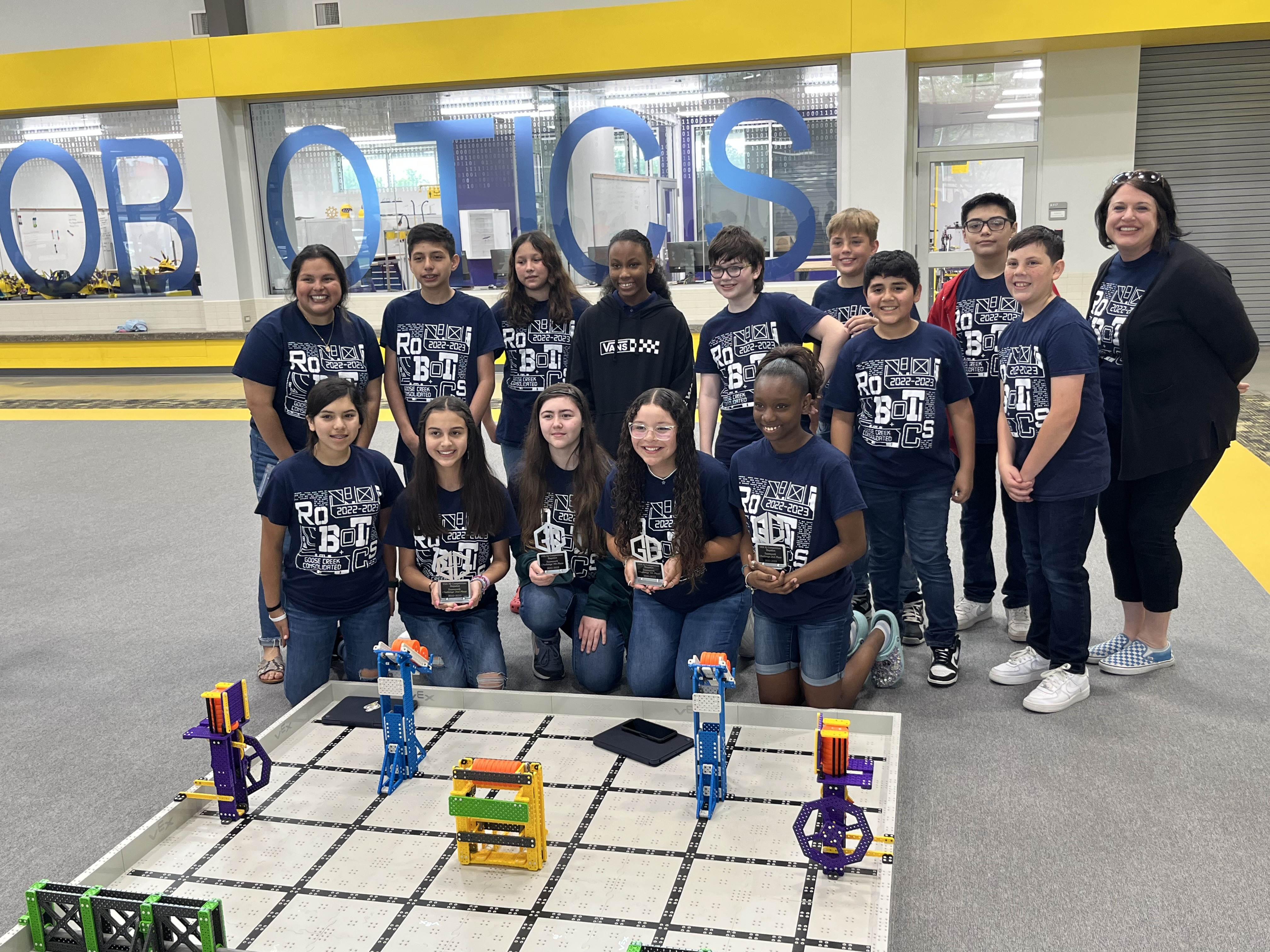 Cedar bayou students proudly pose with their trophies