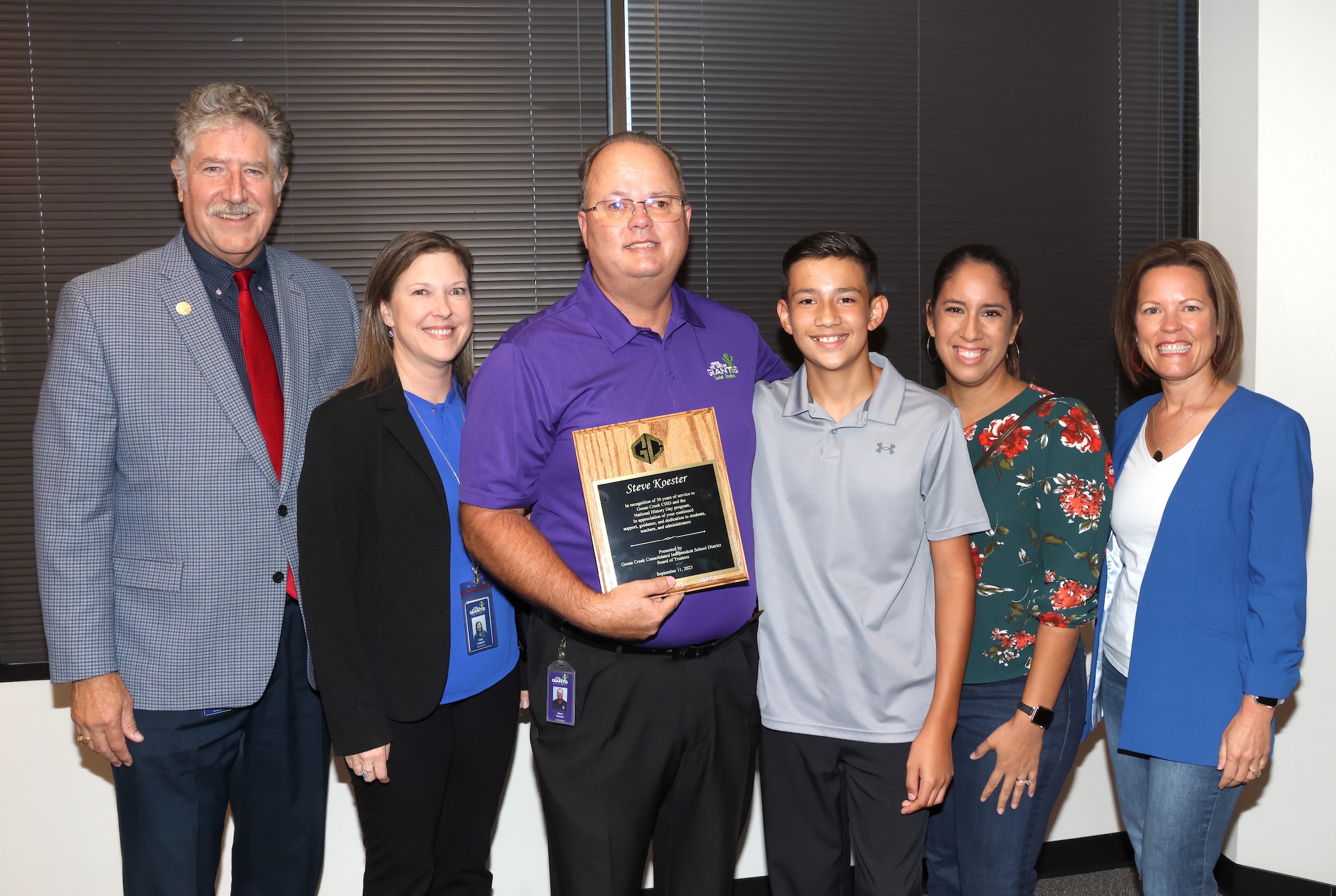 Steve Koester receives plaque for years of dedication to history fair