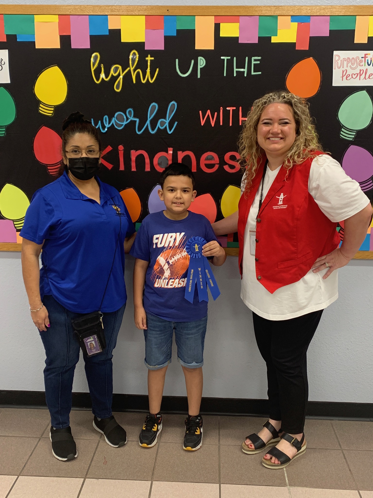 highlands elementary student poses with HLSR representative