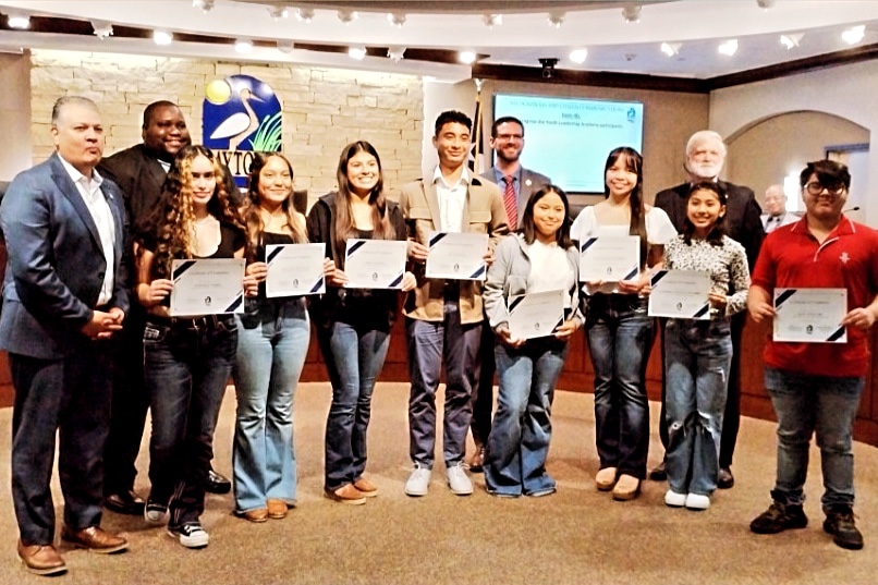 youth leadership program students pose with certificates