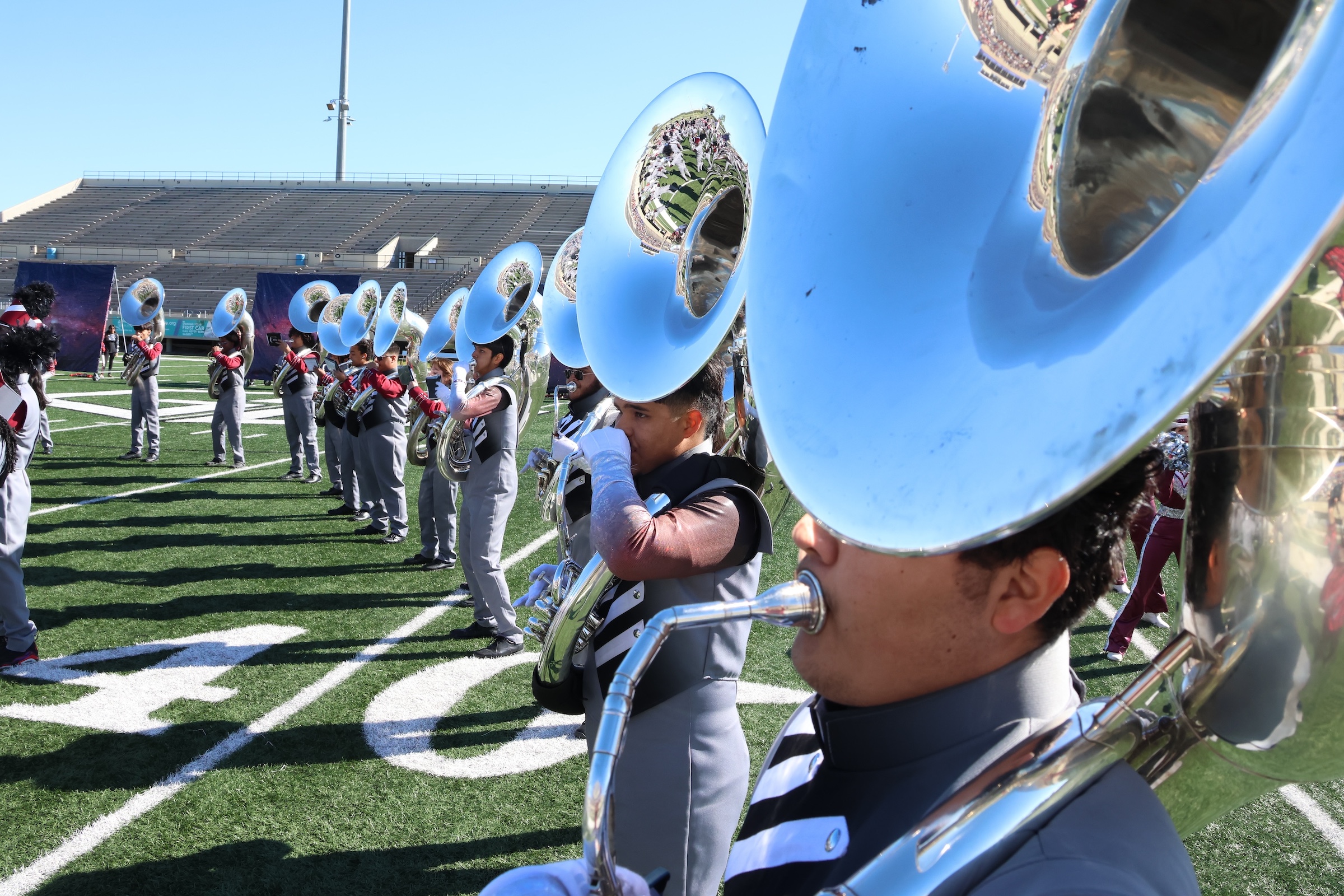 REL band performs on field