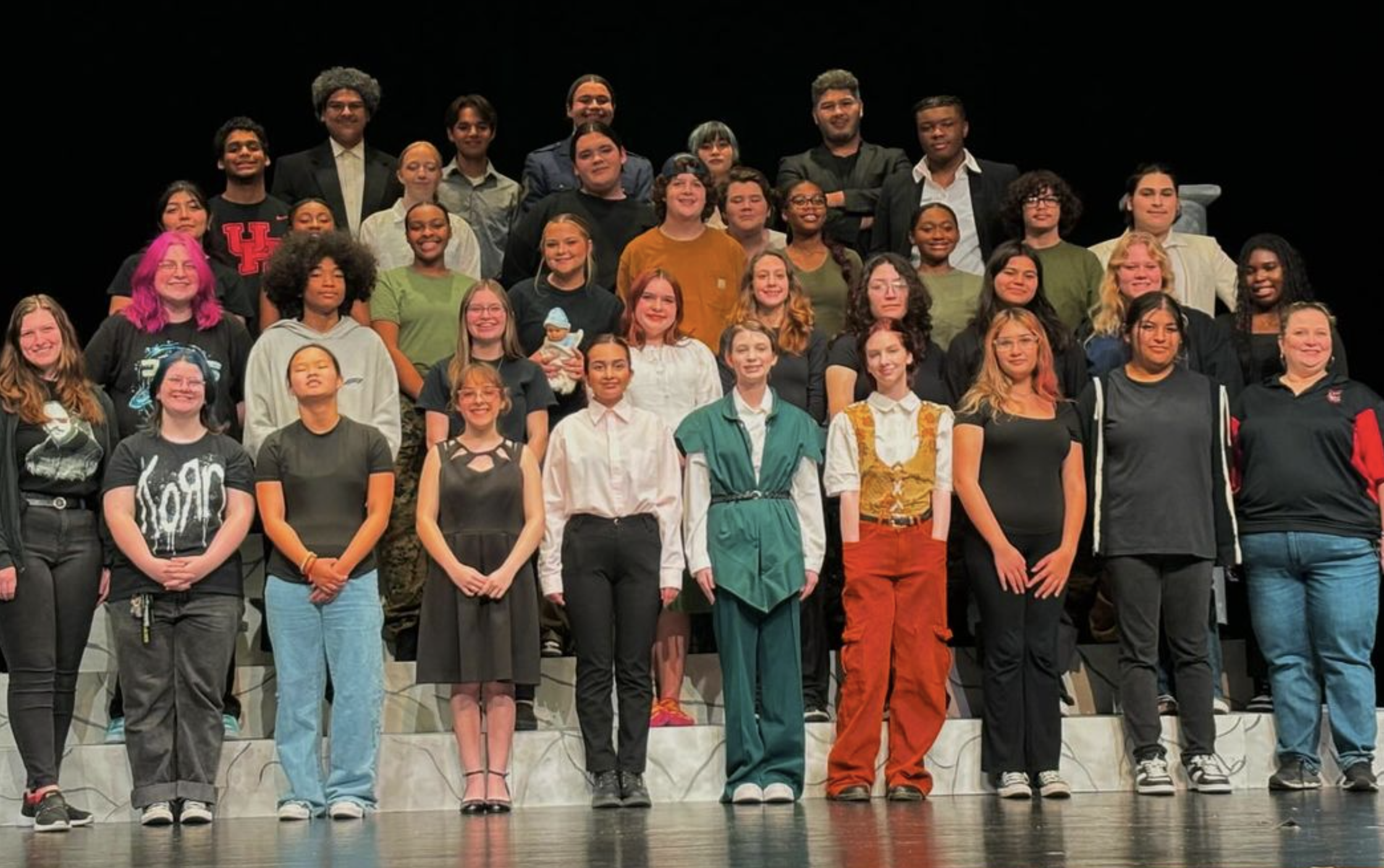 All actors and set managers on stage at goose creek memorial high school