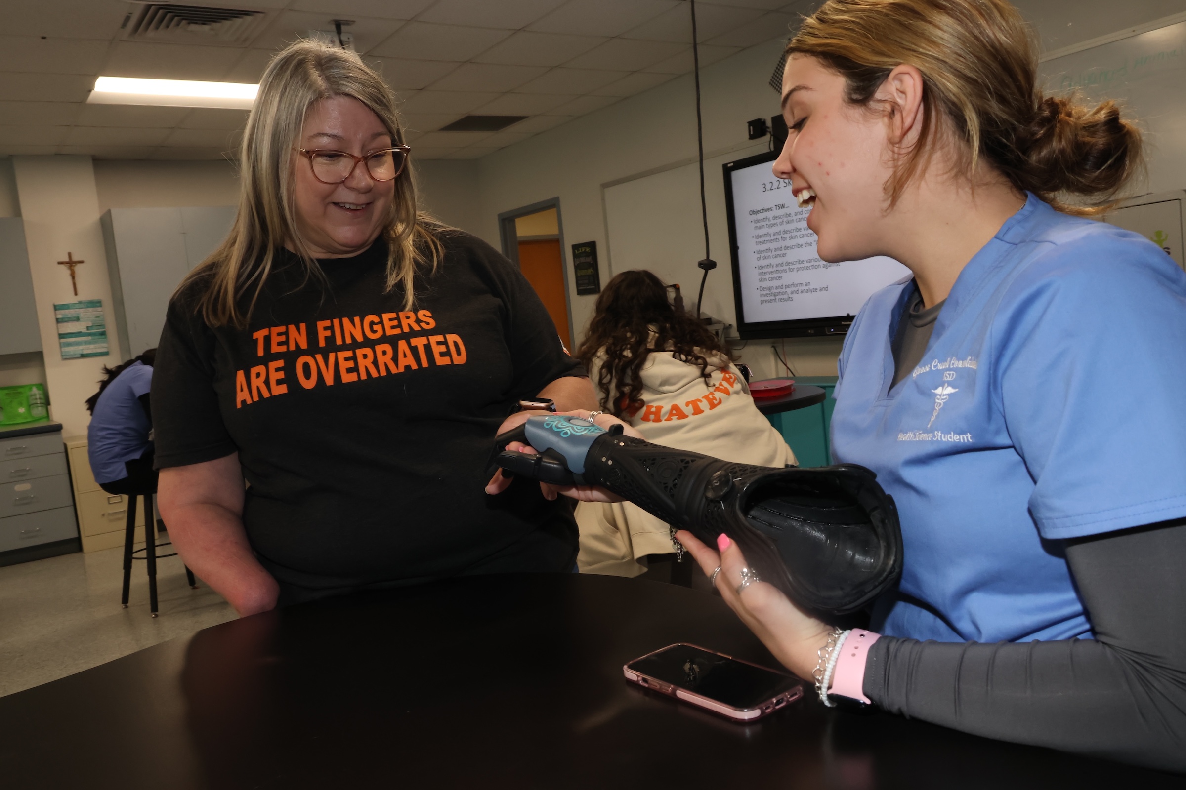 michelle carr speaks with health science academy student