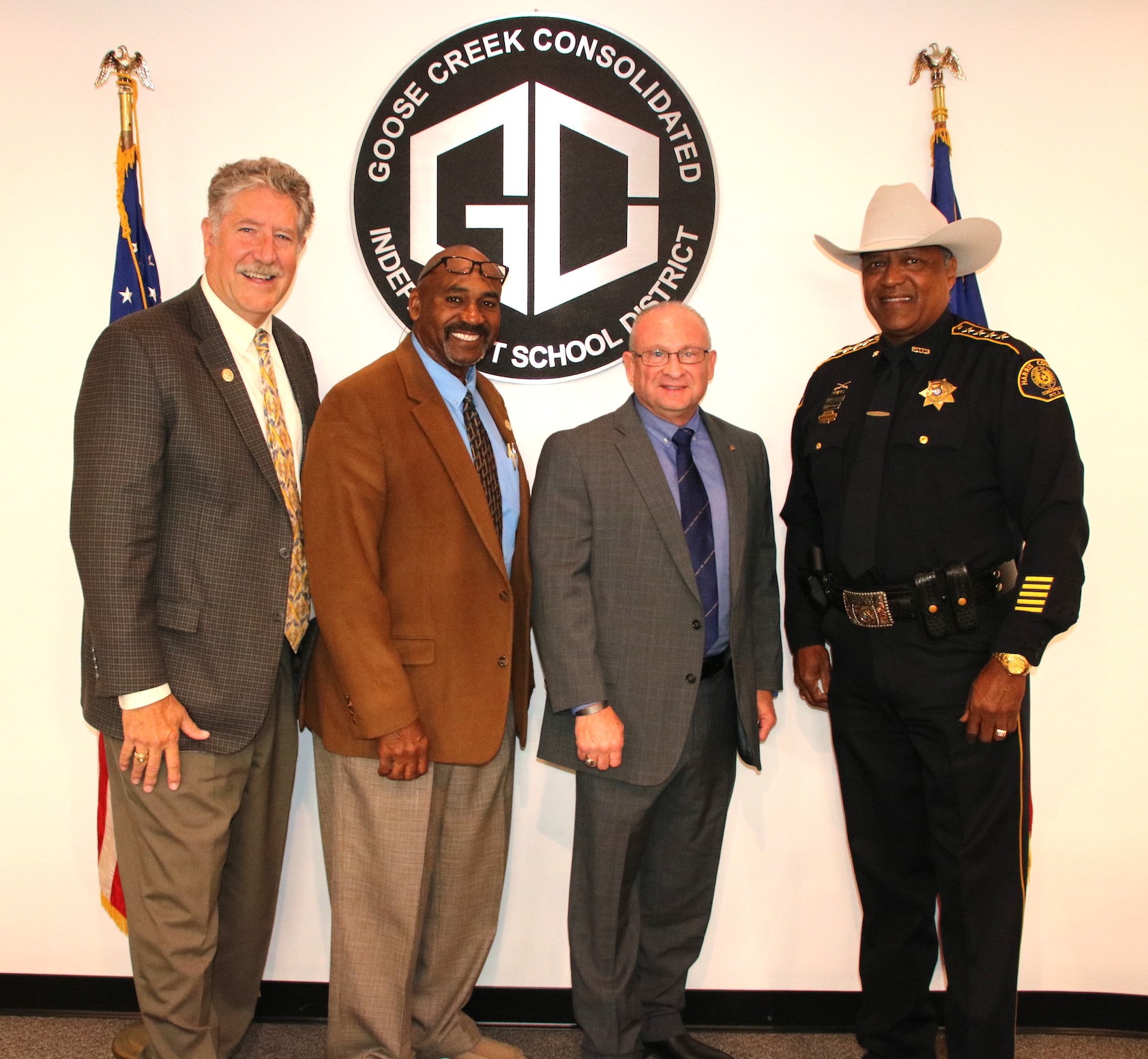 Bonsal poses with obrien, price, and constable eagleton