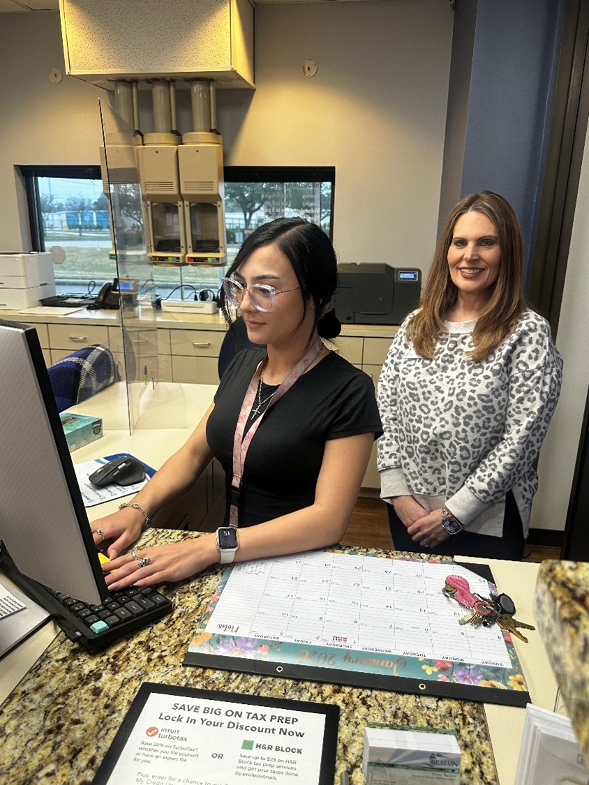 Global Business Academy Student and Beacon Intern work together