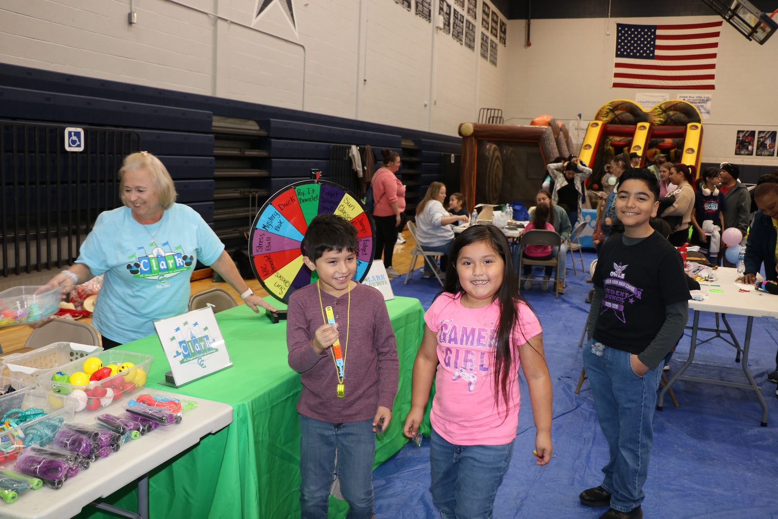 students in front of clark elementary booth