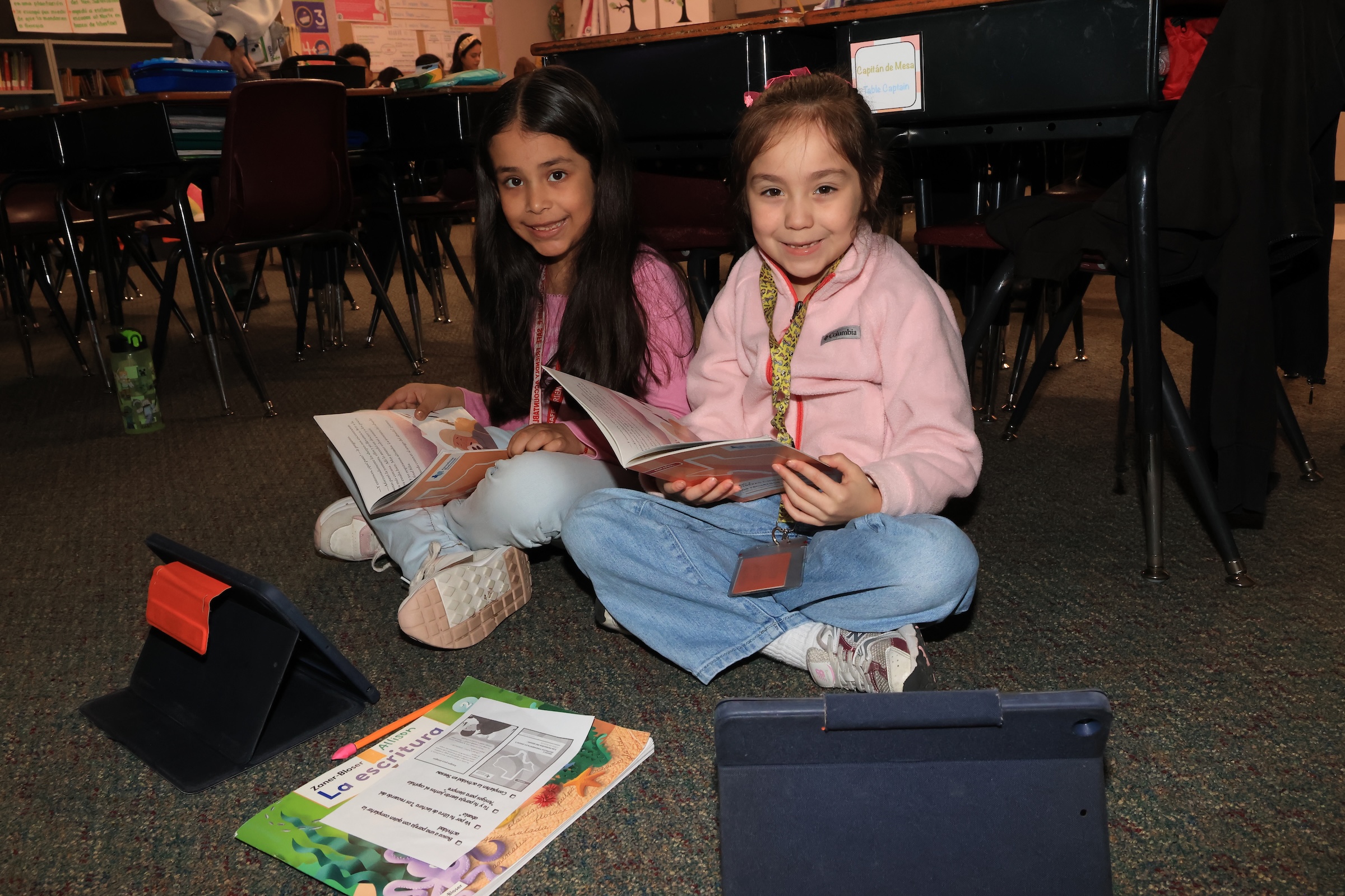 students work together using technology