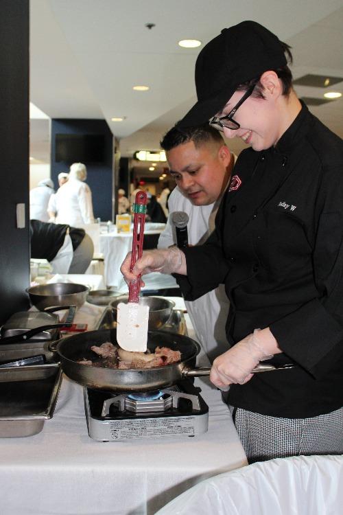 Destiny wraps the tortillas during the Lone Star Chef Competition.